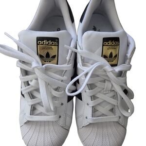 adidas White Shell Toe Sneakers with Black Stripes